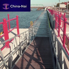 Dock gangway with handrails
