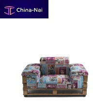 Industrial style armchair PALLETtextileon casterswith armrests
