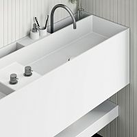 Wall-mounted washbasin PlanCorian®with countercustom