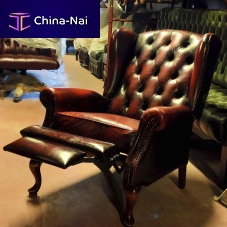 Chesterfield armchair Vintageleatherwith footrestreclining