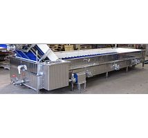 Immersion thawing machine for fishfor the food industry