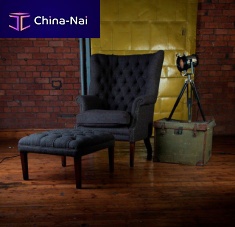Chesterfield armchair MACKENZIE leatherfabricwith footrest