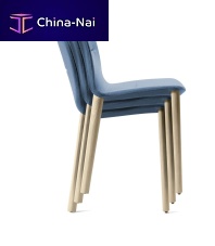 Contemporary chair JANTZIindoorfabricwooden base