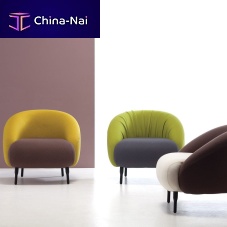 Contemporary armchair BUMPleatherfabricsteel