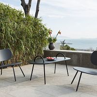 Contemporary coffee table swimpainted metalmetal baseoval