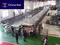 Fully-automatic cake production line for the food industry