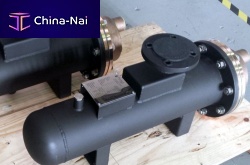 Shell and tube heat exchanger for ships