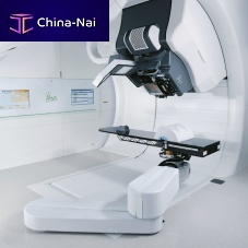 Proton therapy synchrocyclotron with robotized positioning table Proteus® ONEwith integrated CT scanner