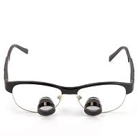 Glasses-type binocular loupe TTL