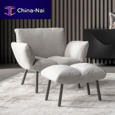 Contemporary armchair Pil leatherfabricwith footrest