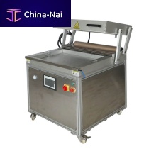 Semi-automatic packing machine DZT7050vacuumfilmfor the food industry