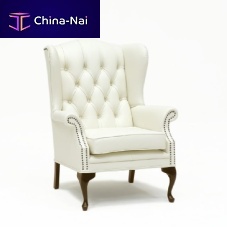 Chesterfield armchair Yorkfabricleatherwith footrest