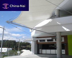 Wire mesh-and-cable tensile structure for entrance canopywith PVC membrane