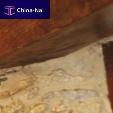 Solid wood beam with symmetrical section