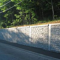 Reinforced concrete retaining wall DURISOL NARROW FOOTPRINT SYSTEMmodularprefabroad