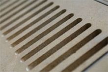 Ceramic overflow grating