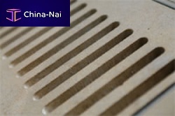Ceramic overflow grating