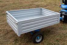 Dump trailer C89077xsingle-axletowedfor waste