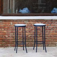 Contemporary bar stool PUERTO galvanised steel baseupholsteredwith footrest